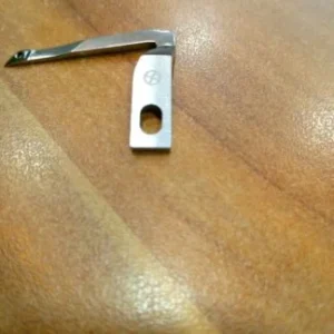 Looper Inferior Brother X77774 para fileteadora, repuesto de alta precisión.