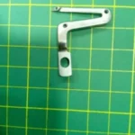 Looper Juki 119998, repuesto de alta precisión diseñado para costuras uniformes y duraderas en máquinas industriales Juki.