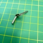 Looper Superior 757, repuesto de alta precisión para costuras uniformes y duraderas en máquinas de coser industriales.